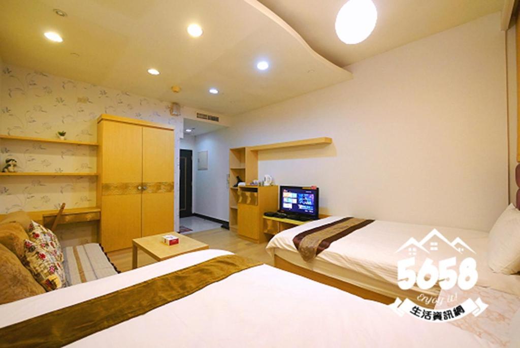 85 Happy Holiday Hotel เกาสง ภายนอก รูปภาพ